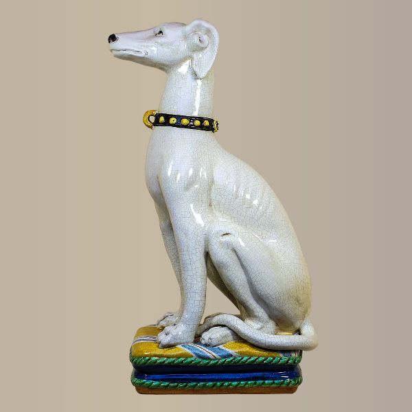 CRACKLED WHITE GREYHOUND ON A CUSHION, CM.70H