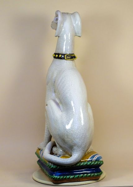 CRACKLED WHITE GREYHOUND ON A CUSHION, CM.70H