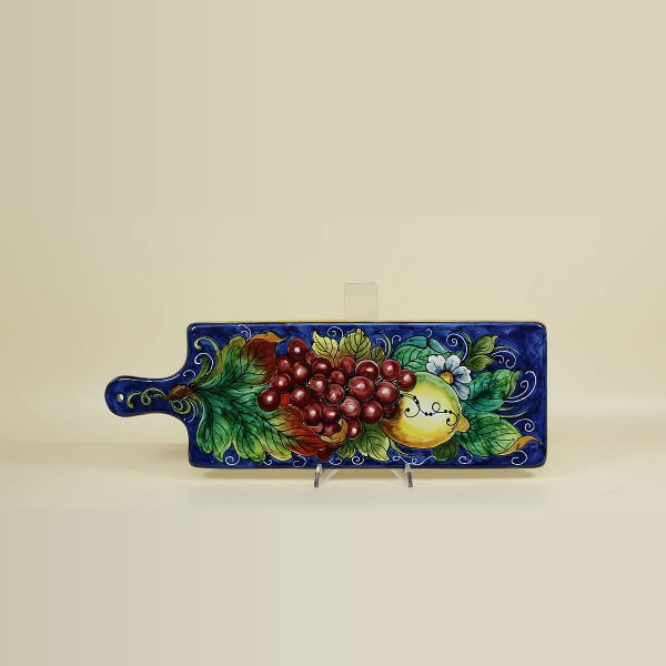 CHOPPING BOARD IN CERAMIC WITH BLUE BACKGROUND, RED GRAPE AND LEMONS