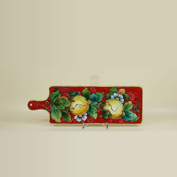 CHOPPING BOARD IN CERAMIC, RED BACKGROUND WITH LEMONS