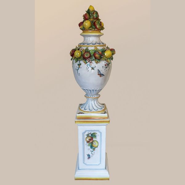 VASE ON A PEDESTAL WITH FRUIT IN RELIEF