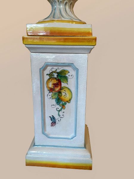 VASE ON A PEDESTAL WITH FRUIT IN RELIEF
