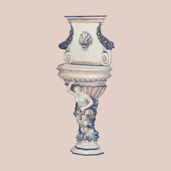 BLUE AND WHITE FOUNTAIN WITH FISH HEAD AND COLUMN WITH MERMAID