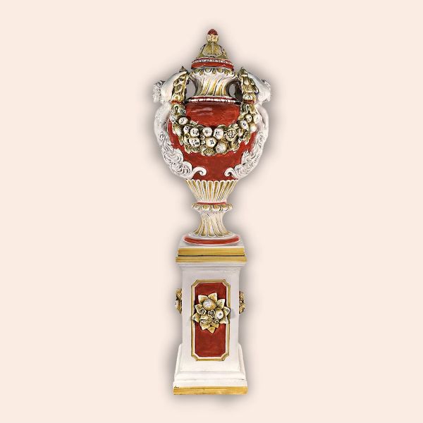 EMPIRE-STYLE VASE WITH FESTOONS AND FRUIT ON A TALL COLUMN, IN OLD PINK AND WHITE, cm.190h