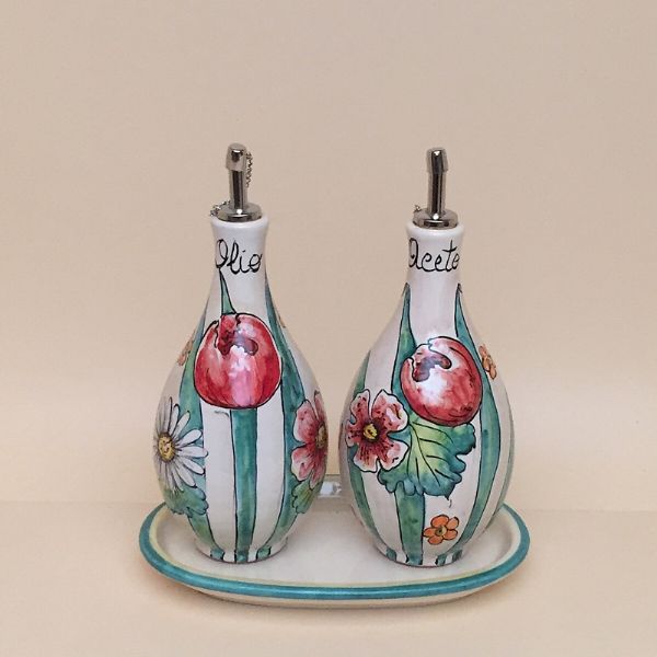 Set of 2 rounded oil and vinegar bottles, cm.19h with tray