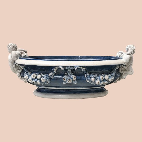 LARGE OVAL FLOWER HOLDER WITH CHERUBS cm.120lx65wx48h