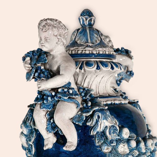 LARGE VASE WITH CHERUBS AND FESTOONS ON A PEDESTAL, cm.180h